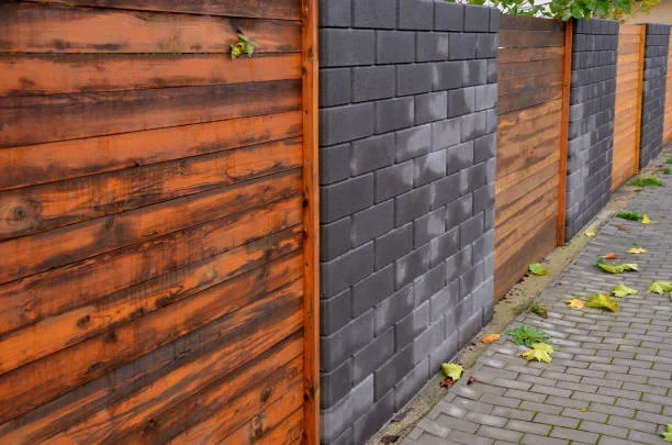 Close view of stained timber gate materials