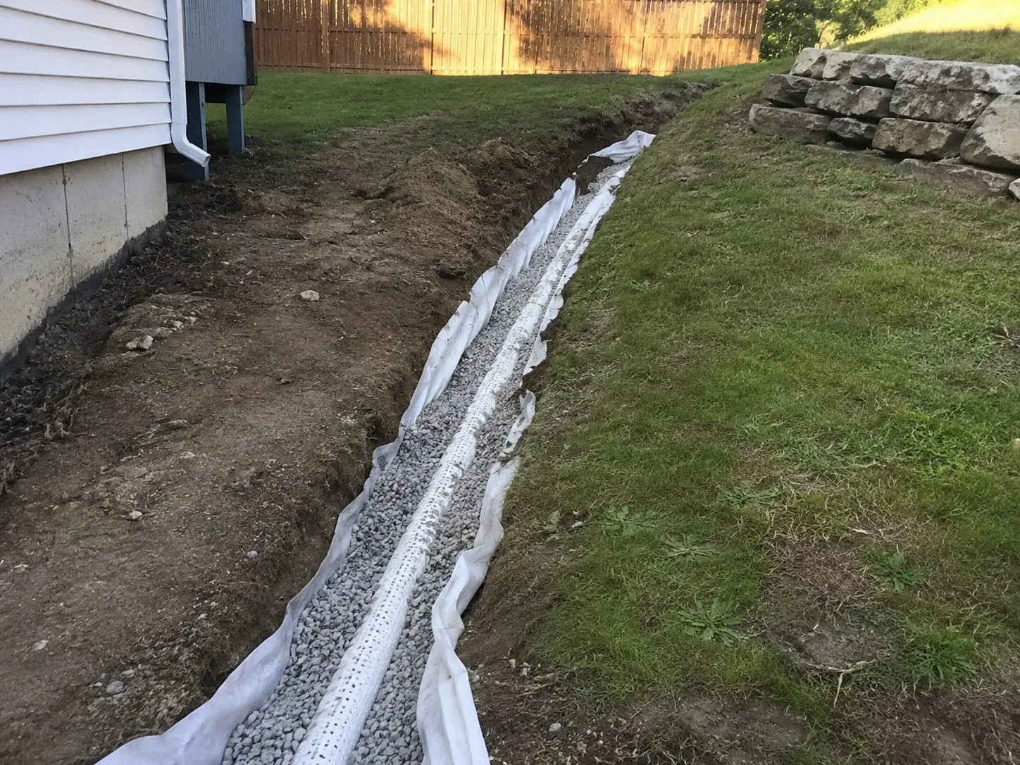 Drainage and retaining work on low-lying clay ground in Te Atatu, Auckland